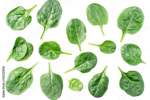 Fresh, Raw Spinach Leaves Isolated on White Background with Clipping Path. Top View of Edible Green Herb - Spinacia oleracea