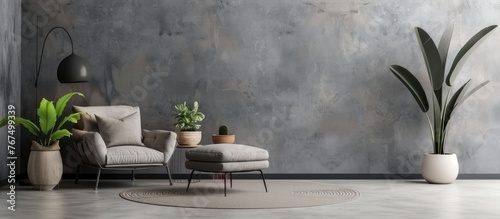 Living room with an armchair and pillow, lamp, potted plant, ottoman, and round carpet on a gray wall background. Real estate and modern interiors blog featuring simple Scandinavian design.