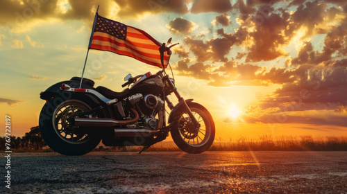 american flag on the back of a Harley Davidson motorcycle at bright sunset, dark clouds in the background