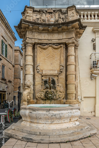 Ancient baroque fountain on St George's square, Valletta, Malta