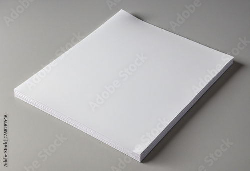 White paper isolated on a gray, changeable background that is blank in portrait A4 size. 