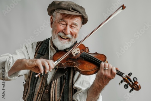 Elderly man playing a violin with a big smile and expressiveness, evoking emotions of joy and passion