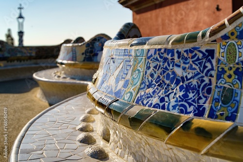 Detail of a colorful mosaic on a bench in Güell Park, Barcelona, Spain, Europe. 