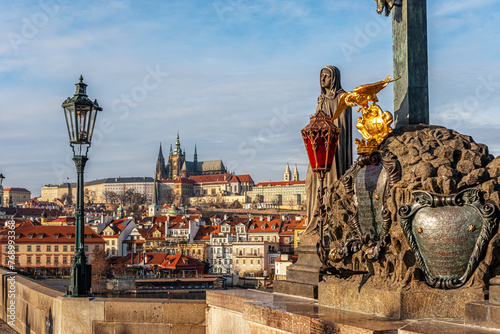 View of old town and famous St. Vitus Cathedral from the Charles Bridge in Prague, Czech Republic.
