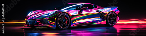 A colorful car is shown in a neon light. The car is a Corvette and is shown in a very bright and colorful way