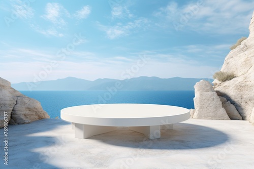 a white round table on a white surface overlooking a body of water