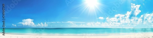 panoramic view beautiful beach with white sand turquoise ocean water and blue sky with clouds in sunny day natural background for summer vacation