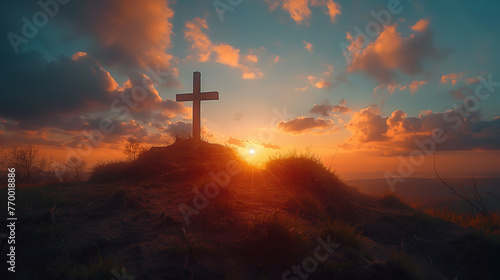 Cross on a hill at sunset and blue sky