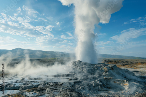 A large geyser spews steam and water into the air