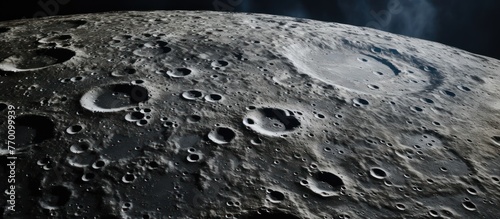 The moon's surface, marked by a myriad of craters