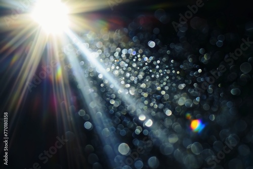 A Lens Flare with beautiful light beams on a black background.