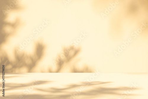 Wall interior autumn background, studio, and backdrops show products. with shadow leaf color beige background for text insertion and presentation of product