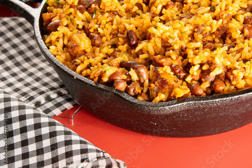 Baião de Dois traditional Brazilian food made with rice, beans, sausage and rennet cheese