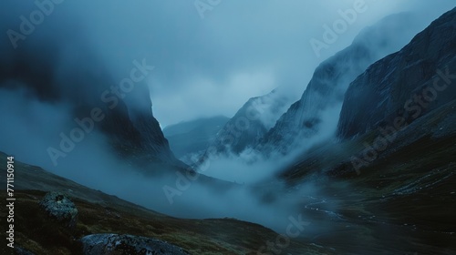 Foggy mountain pass at dawn, serene and majestic