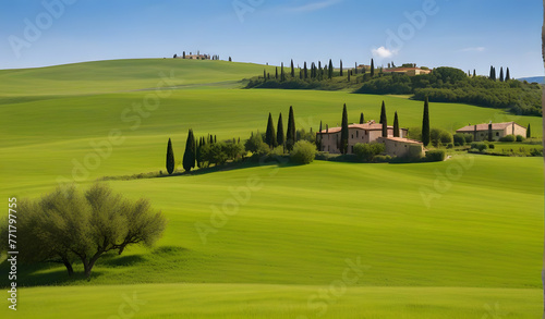 Country house on rolling hills in Val d'Orcia, Tuscany, Italy. Green meadow at springtime.