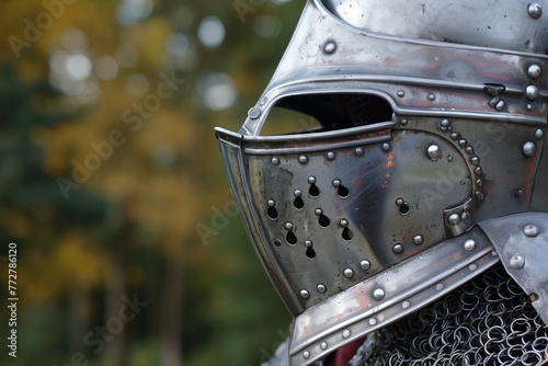 closeup of a fluted bascinet on a knight outside