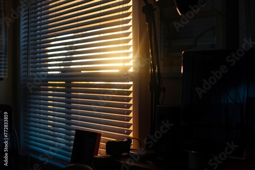 studio at twilight with light peeking through blinds