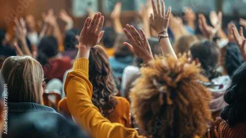 Audience members participating in a live poll. 