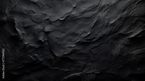 A dark black wall with a solid black background