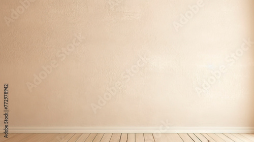 A room featuring a wooden floor and a wall up close