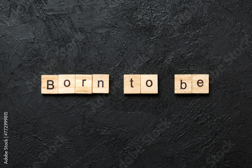 born to be word written on wood block. born to be text on cement table for your desing, concept
