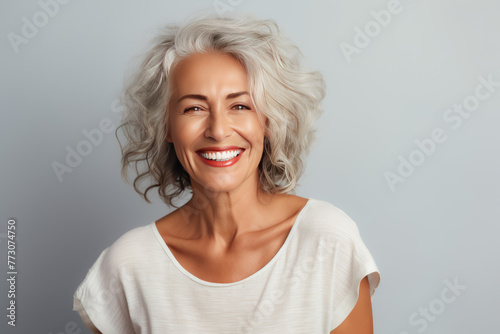  Charismatic Senior Woman with White Curly Hair Radiating Joyful Confidence