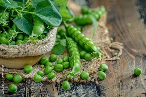 Fresh peas on wooden table 