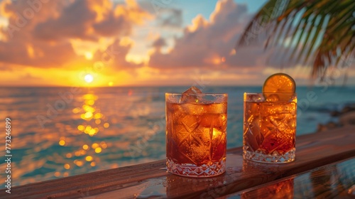 Capture the essence of summer with cocktails on a luxury tropical beach resort at sunset. Showcase exotic summer drinks amidst a backdrop of youth, vacation, party vibes, and the allure of summertime.