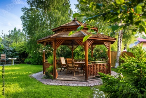 Wooden gazebo in lush backyard garden