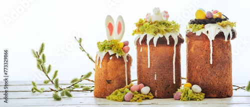 Paska - Easter Eve sweet bread with icing decorated with eatable "moss" still life with willow. Popular dessert during Eastern Orthodox Easter. Old cultures traditions and healthy eating concept image