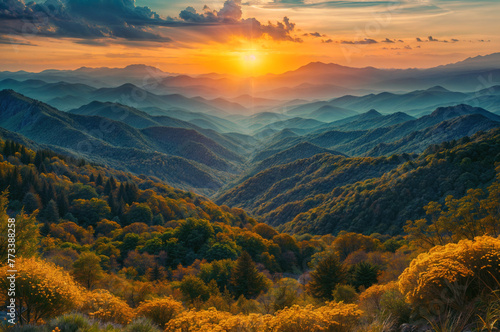 A view of the mountain range at sunset, the hills are decorated with fall foliage, creating a tranquil and picturesque fall scene