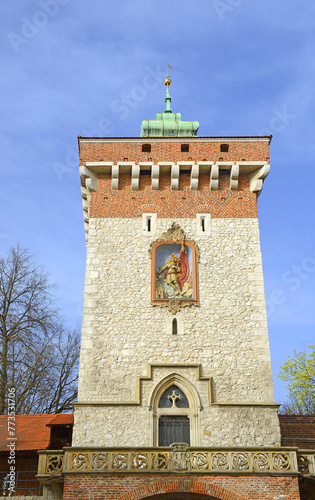 Krakow, Poland - St. Florian's Gate, the medieval Gothic tower with a gate dating to the 14th century and adjacent to the city walls. Krakow is UNESCO World Heritage Site