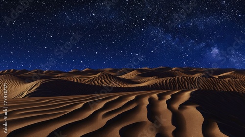 A desert at night with a sky full of stars