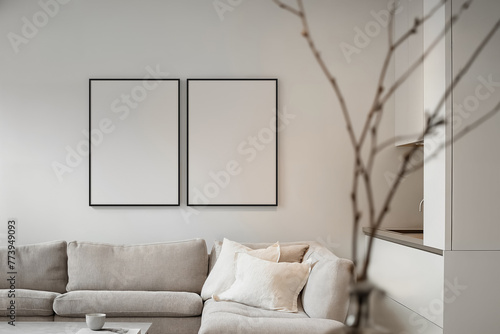 Mockup of two poster frames (Din A) in the kitchen room interior. Minimalistic apartment design: Light gray interior with a poster frame. Laconic apartment design: light room with beige accents