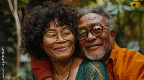 Elderly African American couple enjoying the fresh air outdoors