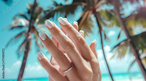 close-up of a hands with beach manicured nails 