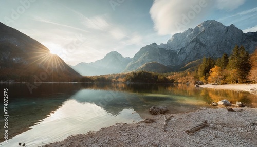 awesome alpine highlands in sunny day amazing mountain lake in slovenia in sunny day famous jasna lake in julian alps wonderful nature landscape in autumn popular travel and hiking destination