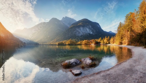 fantastic autumn panorama on hintersee lake colorful morning view of bavarian alps on the austrian border germany europe beauty of nature concept background