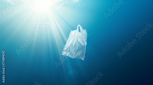 Plastic bag floating in the ocean, an environmental problem