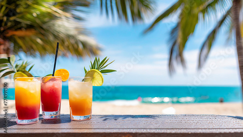 Cocktails on a tropical beach with palm trees and blue sky