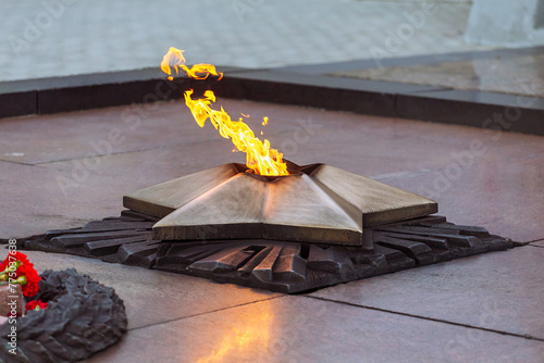 eternal flame on the memorial monument, close-up.