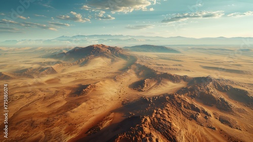 An aerial view of a vast desert landscape stretching to the horizon