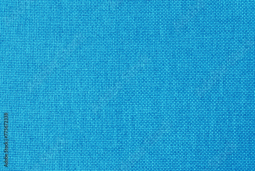 Light blue fabric cloth texture background, seamless pattern of natural textile.