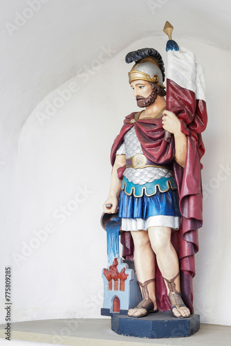 CZARNY DUNAJEC, POLAND - MARCH 29, 2024: Figure of Saint Florian at the church in Czarny Dunajec, Poland.