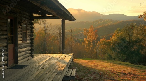 Wooden house in the mountains at sunrise. Beautiful autumn landscape.