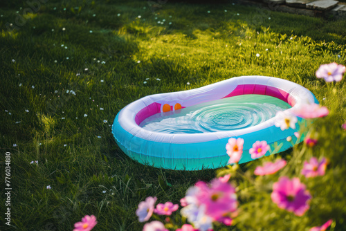 Outdoor blue inflatable pool with clean water.