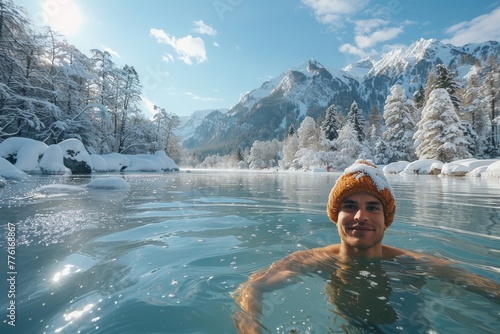 A man relaxes in a natural hot spring, surrounded by snowy mountain scenery, conveying tranquility and the beauty of nature