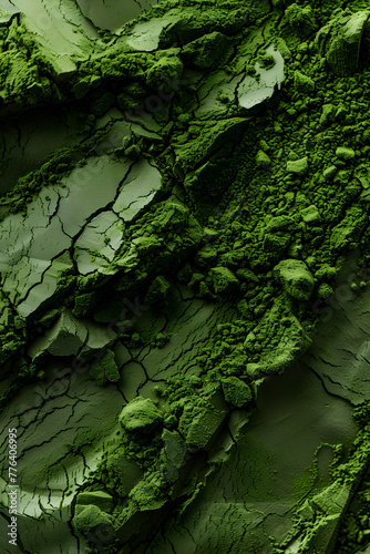 A close up of green powder with a rough texture. Concept of ruggedness and naturalness, as if the powder is a part of the landscape