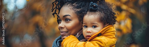 Mother-Daughter Bliss: African American Single Mom and Child Delighting in Park Fun