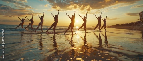 a dynamic yoga session at sunrise, where a group of young women perform synchronized poses on a serene beach, reflecting harmony between body, mind, and nature.